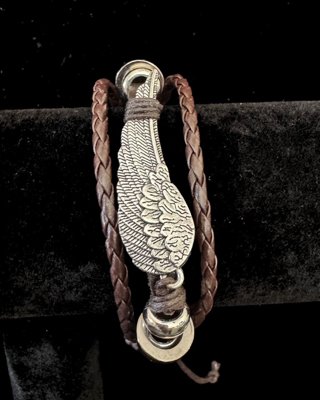The Fallen Wing — Braided Leather Feather Bracelet
