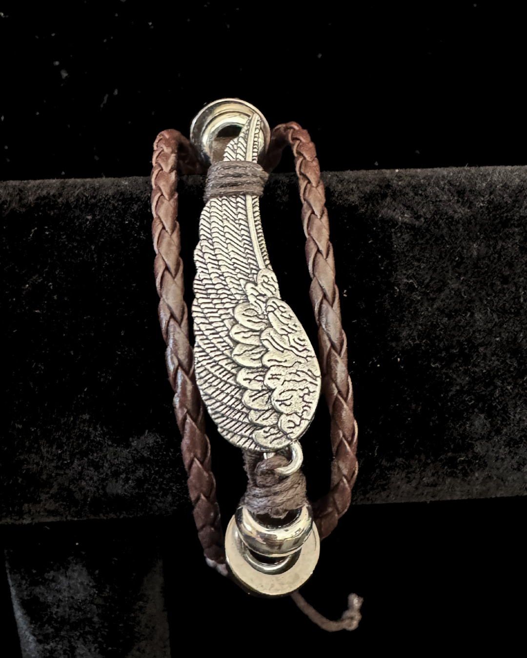 The Fallen Wing — Braided Leather Feather Bracelet